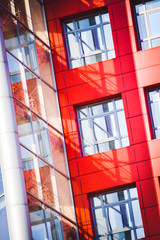 facade of the house red in the high-tech style
