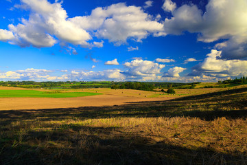 Fototapeta premium Beautiful landscape with snopkami straw on the field.