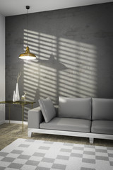 living room with a sofa and sunlight on the wall