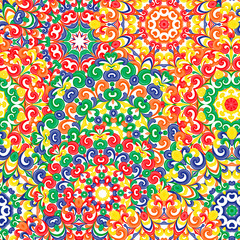 Fototapeta premium Seamless colorful ethnic pattern with mandalas in oriental style. Round doilies with red, green, yellow, orange, curls and swirls weaving in arabesque traditional lace ornament. Vector illustration.