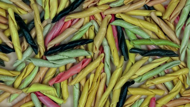 Colorful handmade italian pasta food. Turntable anticlockwise