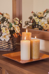  candles on a sideboard
