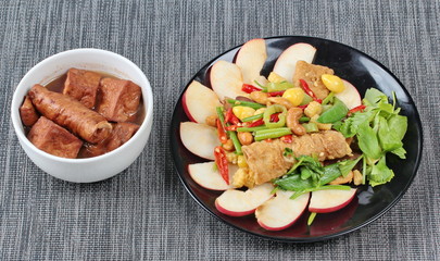 Chinese Vegetable festival  food as fried ginkgo with mixed vegetables served with  fried tofu and fermented flour in brown soup ,  