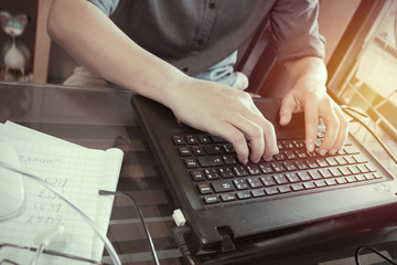 Close-up of typing female hands on keyboard