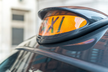Fototapeta premium Taxi sign in London, UK