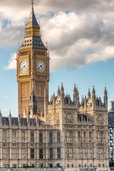 Fototapeta na wymiar The Big Ben and Houses of Parliament against blue sky - London,