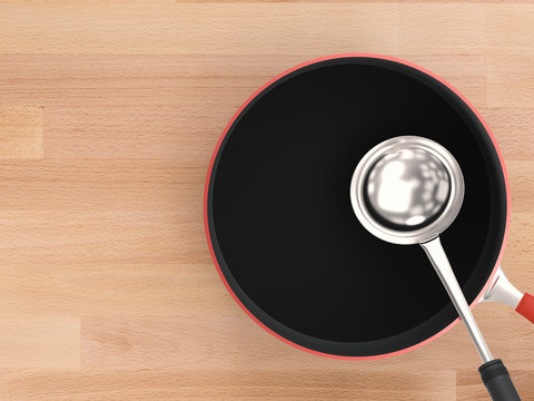 sauce pan with ladle top view