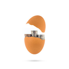Money and broken egg concept for saving money on white background.