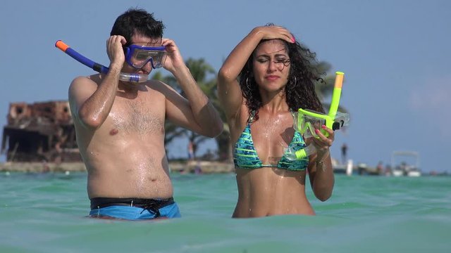 Swimmer Tourists In Ocean With Snorkels