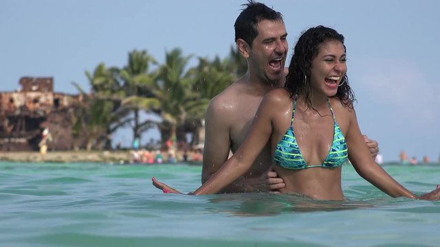 Dating Couple Having Fun On Tropical Vacation