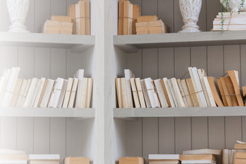 Obraz na płótnie Canvas Bookshelf is white book with wooden white shelf.