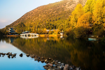 Fototapeta premium The Black Dragon Pool(Heilongtan) located at the foot of Elephant Hill, Lijiang Old Town, Yunnan, China.