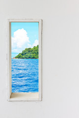 White wood wall window with sea beach view.