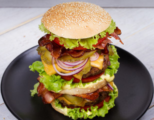 Burger With Beef, Bacon, Tomato, Cheese, Lettuce and Onion