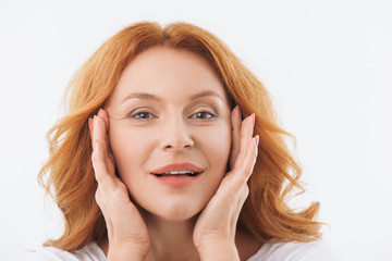 Obraz premium Happy lad is caring of her apperance