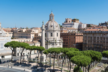 Fototapeta na wymiar Trajan's Column and church in Rome, Italy
