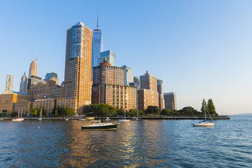 Fotobehang Scenic late afternoon view of the Downtown Manhattan skyline from the Hudson River © lazyllama