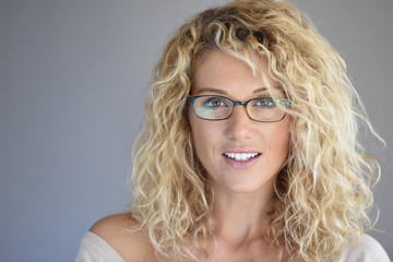 Obraz premium Portrait of attractive blond woman with eyeglasses, isolated