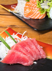 Japanese raw fish or sashimi served on a plate