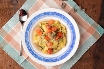 Tortellini with zucchini carrot and cherry tomatoes