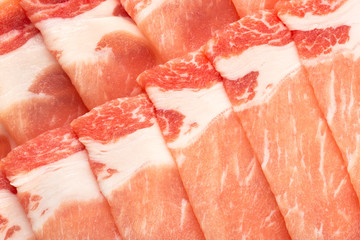 Close up shot on thinly sliced pork