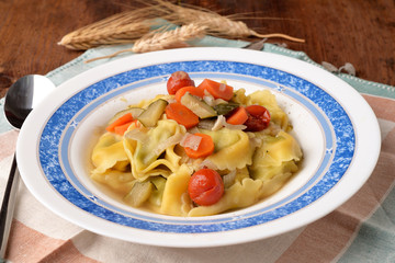 Tortellini with zucchini carrot and cherry tomatoes