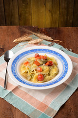 Tortellini with zucchini carrot and cherry tomatoes