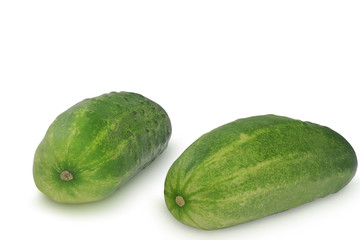 Two cucumbers isolated on white background
