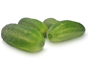 Several cucumbers isolated on white background