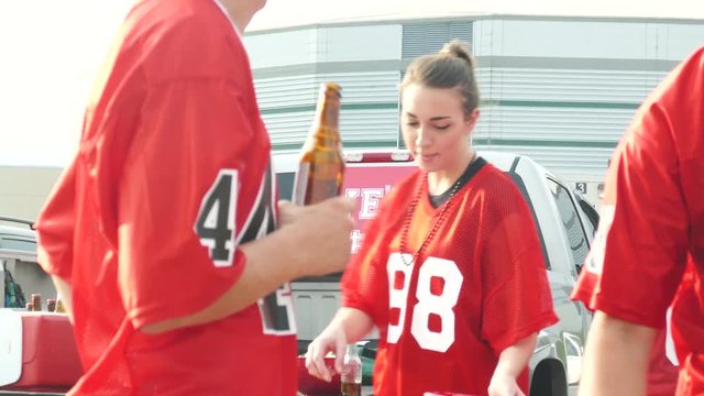 Extensive video series with football fans at a tailgate party, having fun.  Set in a parking lot outside an arena...Shot in 4k on Lumix FZ1000.