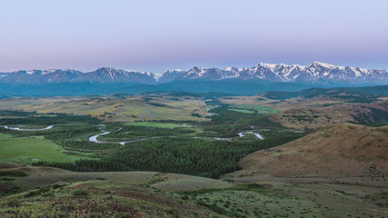 Fototapeta na wymiar Pre-dawn colors Altai/Coloured valley of river Chuya and North-Chuya ridge dawn, Altai Mountains, Siberia, Russia