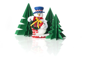 Snowman doll as christmas decoration isolated on white background