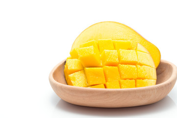 Mango slice cut to cubes isolated on white background