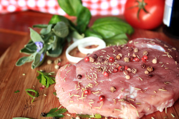 Raw fresh meat and vegetable on wooden background 

