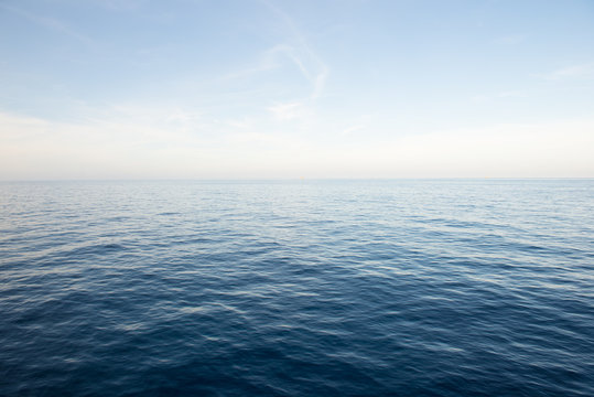 Fototapeta Blue sea and blue sky background.