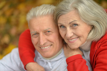 Senior couple in autumn park