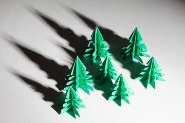 Colored origami trees. Christmas decoration trees.
