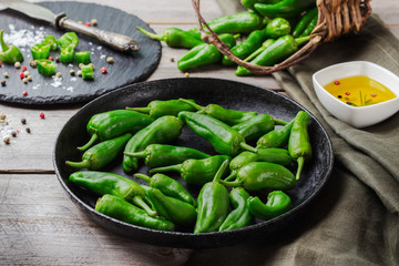 Raw green peppers jalapeno pimientos de padron traditional spanish tapas