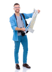 Handsome tourist looking at map isolated on white