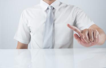 Businessman pressing an imaginary button