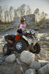 Sexual woman riding on atv