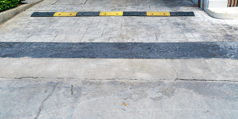 Yellow and black speed bump