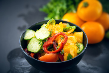 Close Up of colorful salad from tomatoes, cucumbers