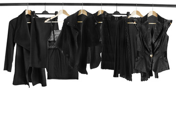 Black clothes on clothes racks - obrazy, fototapety, plakaty