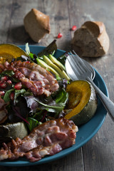 Vegetable salad with baked pumpkin and bacon