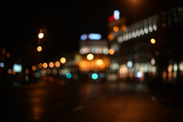 Fototapeta na wymiar city lights in the evening blurring background