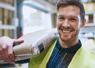 Smiling happy handsome young handyman