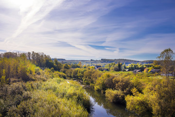 Naklejka premium Rural autumn landscape with river