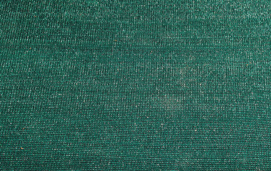 Green mesh cellular coating fabric closeup texture