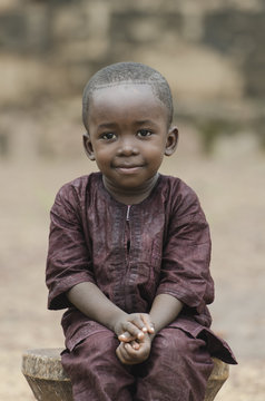 Handsome young African boy smiling happily outdoors (Peace for Africa)
